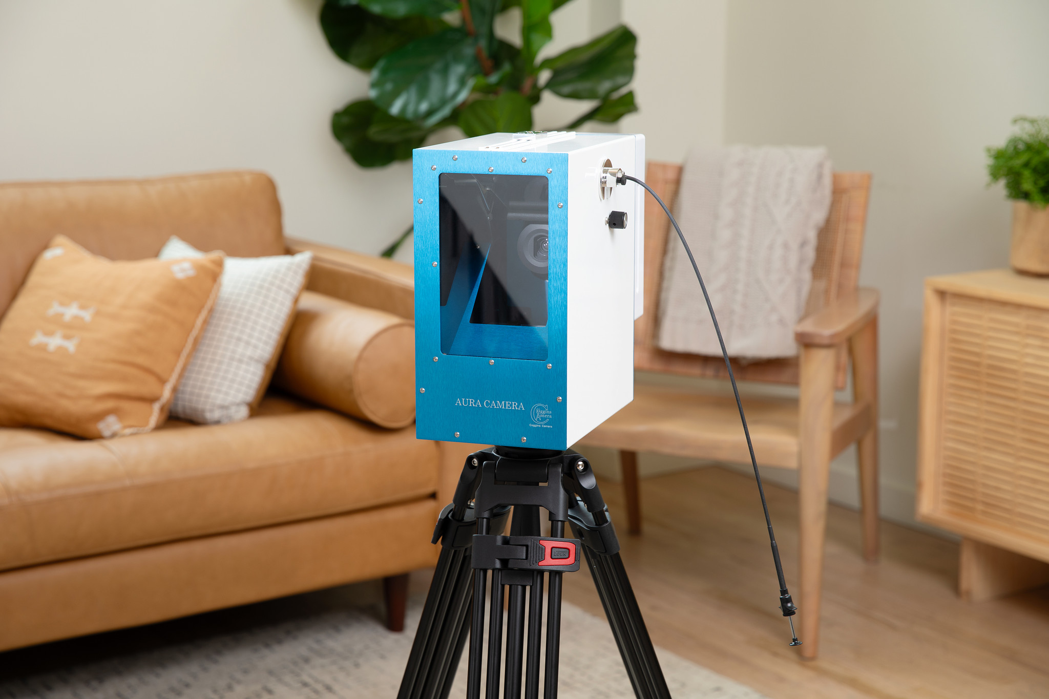 Aura Camera 6000 setup with tripod in living room